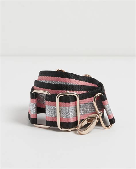 oliver bonas silver stripe strap.